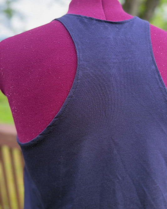 Plus size navy blue racerback tank top view of the racerback. 